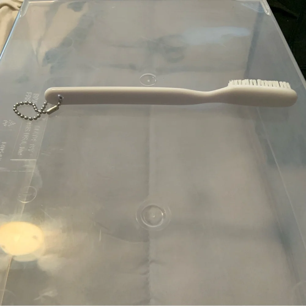 Nike White Keychain with Black Text TOOTHBRUSH